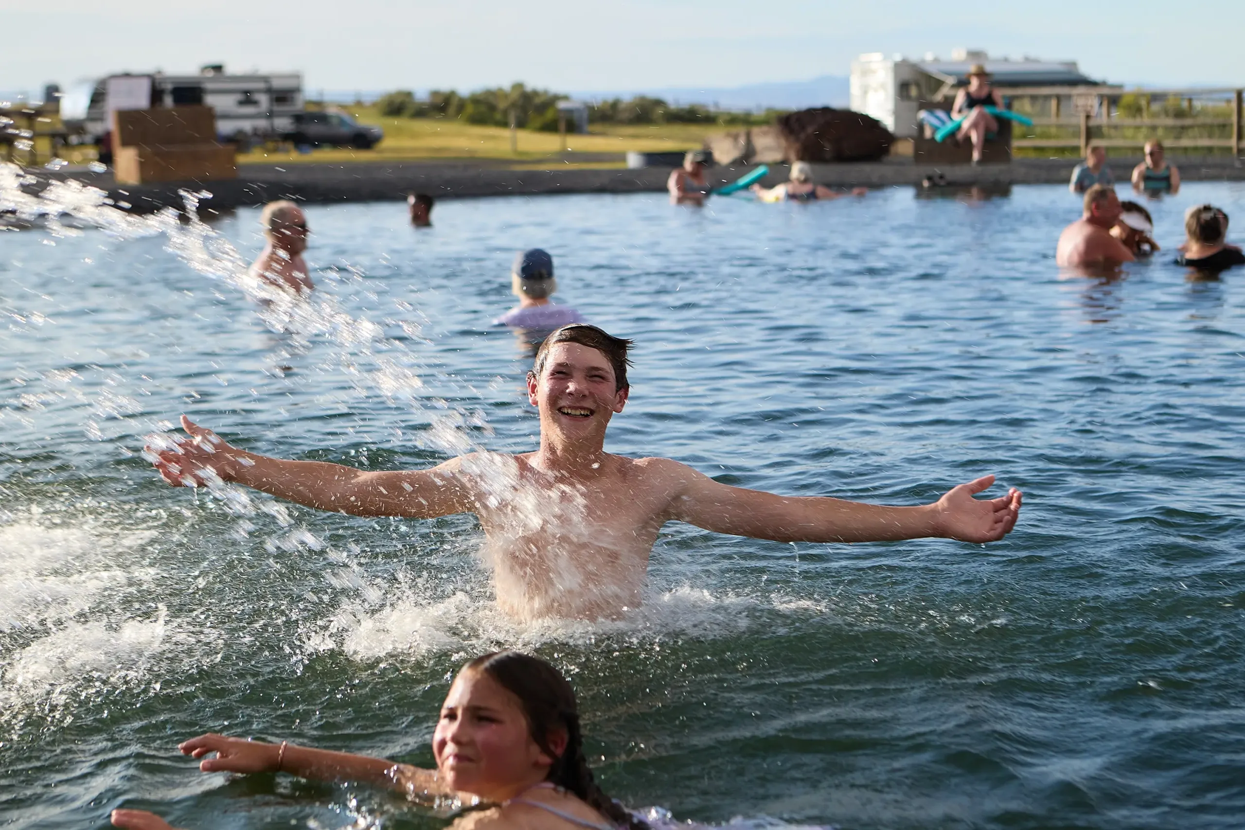 Kids playing in the fountain at Alvord hot springs in Harney County.