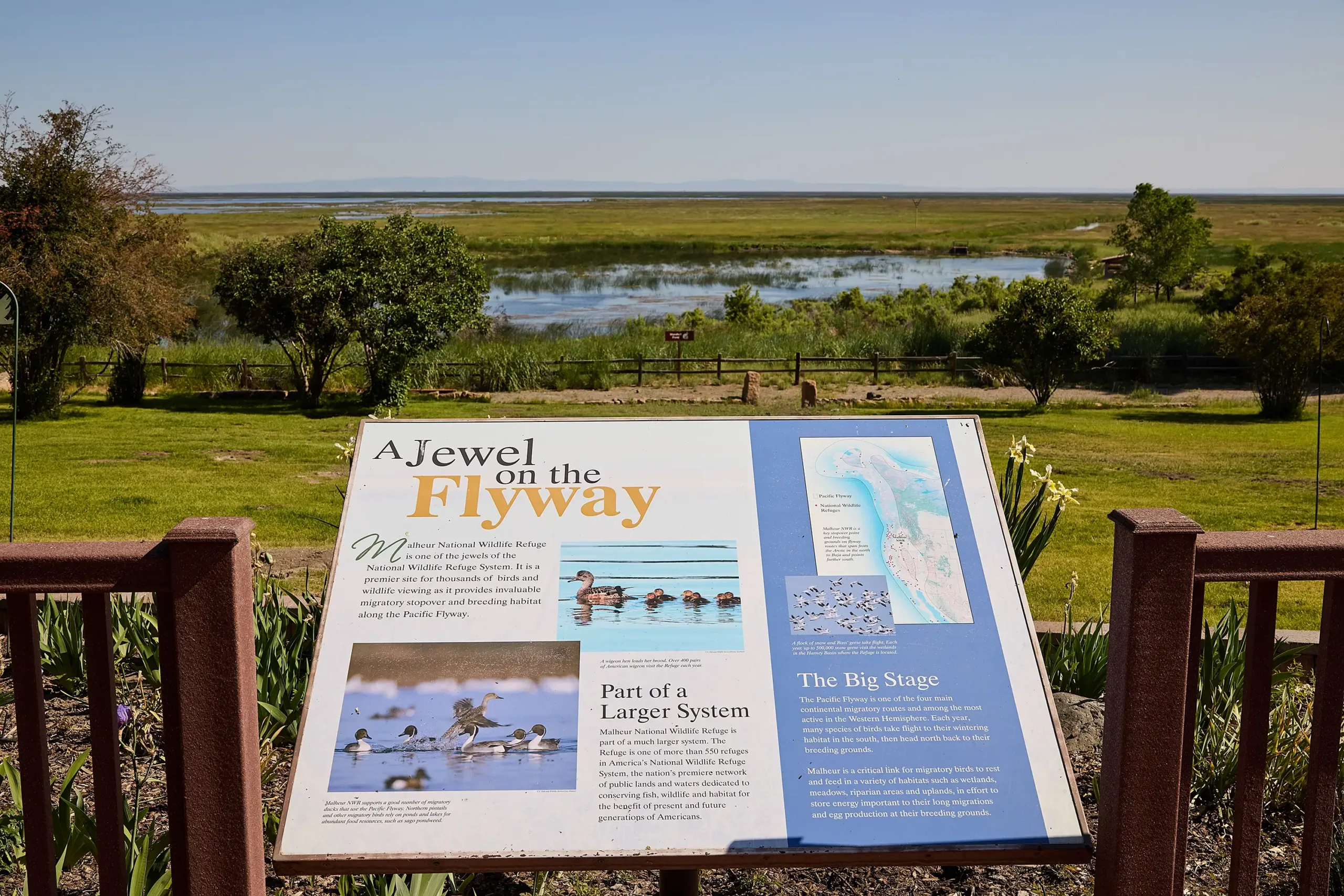 A sign about the Flyway with a landscape view